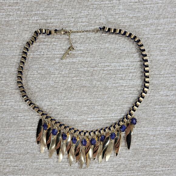 Kenneth Cole Gold Tone Blue Gem Statement Necklace Dangling Leaf Shaped Chain - Picture 1 of 15
